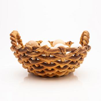 Ingrid Herrlin, basket with eggs, stoneware.