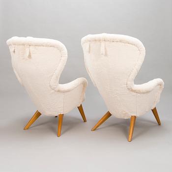 CARL GUSTAF HIORT AF ORNÄS, Two mid-20th century 'Siesta' armchairs for för Puunveisto Oy - Träsnideri Ab.