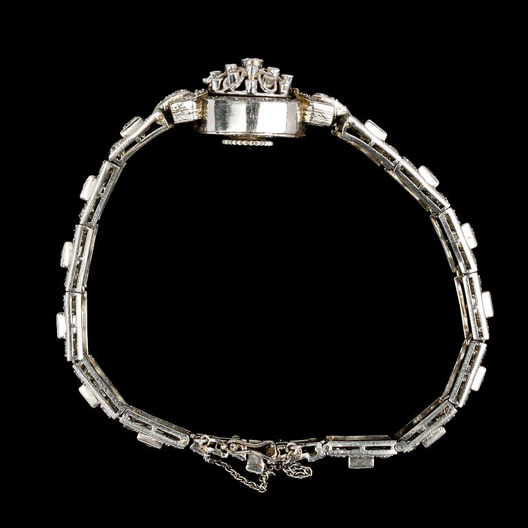 LADIES WRIST WATCH, Jaeger-LeCoultre, brilliant cut and eight cut diamonds, tot. app. 2.80 cts.