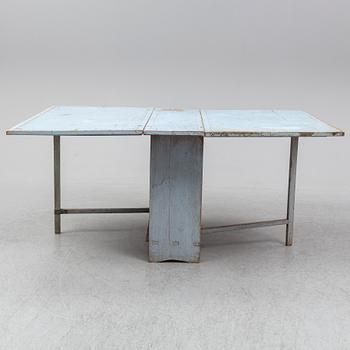 A 18th Century painted gate leg table.