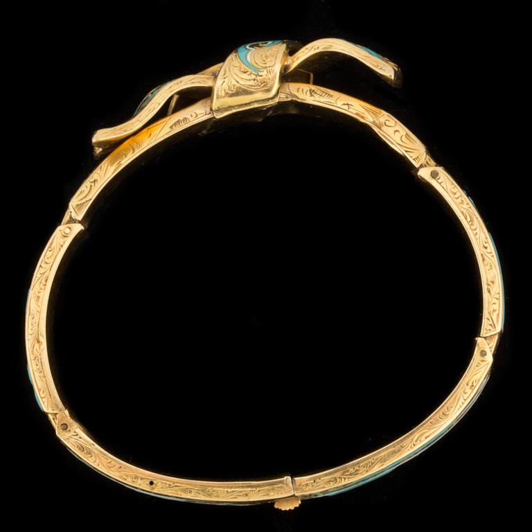 ARMRING, 14 k guld med vit och turkos emalj, 1800-tal. Vikt ca 10 g.