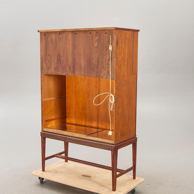 A Swedish Modern 1950s mahogany bar cabinet.
