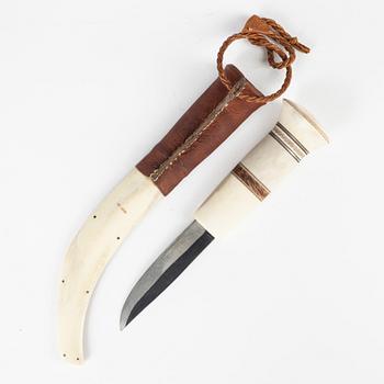 A reindeer horn knife by Olav Svonni, signed and dated 1989.