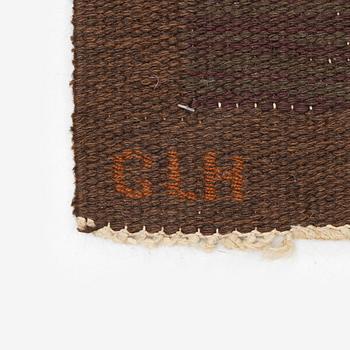 Margareta Grandin-Nettles, a flat weave 'Smaragd' carpet, c. 302 x 203 cm, signed GLH MG.