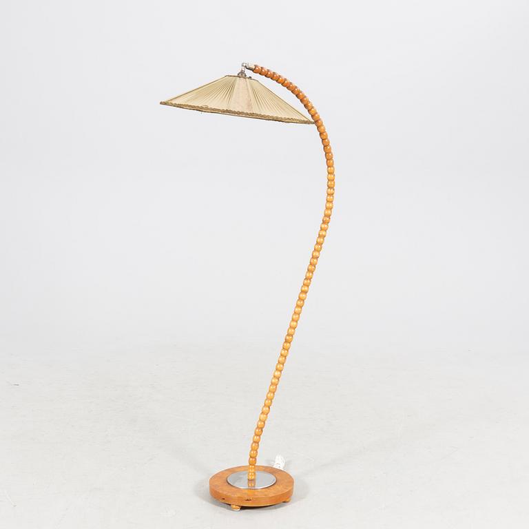 A 1940s floor lamp.