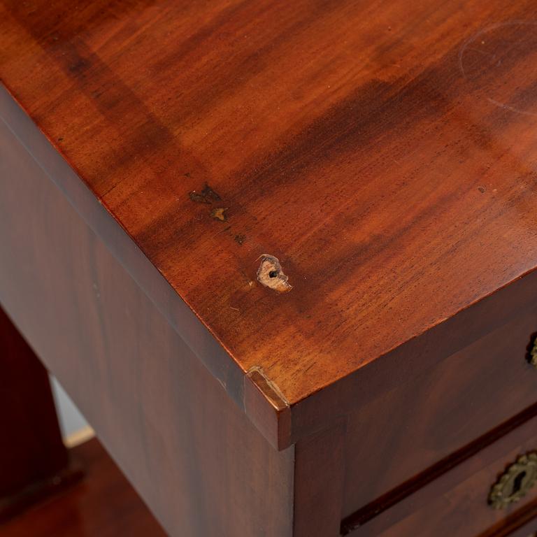 A mahogany console table, Stockholm, first half of the 19th century .