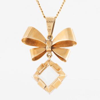Necklace, 18K gold with synthetic white stone, in the shape of a bow.