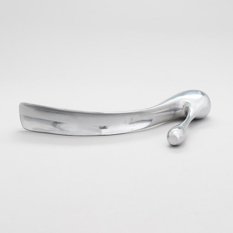 A metal shoe horn by Manolo Blahnik, 2000s.