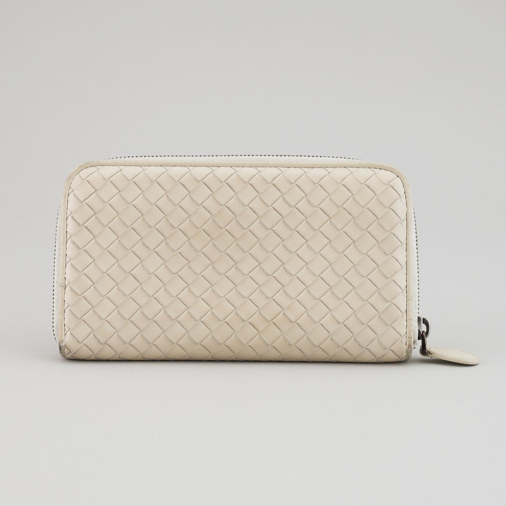 BOTTEGA VENETA, a intrecciato leather wallet.