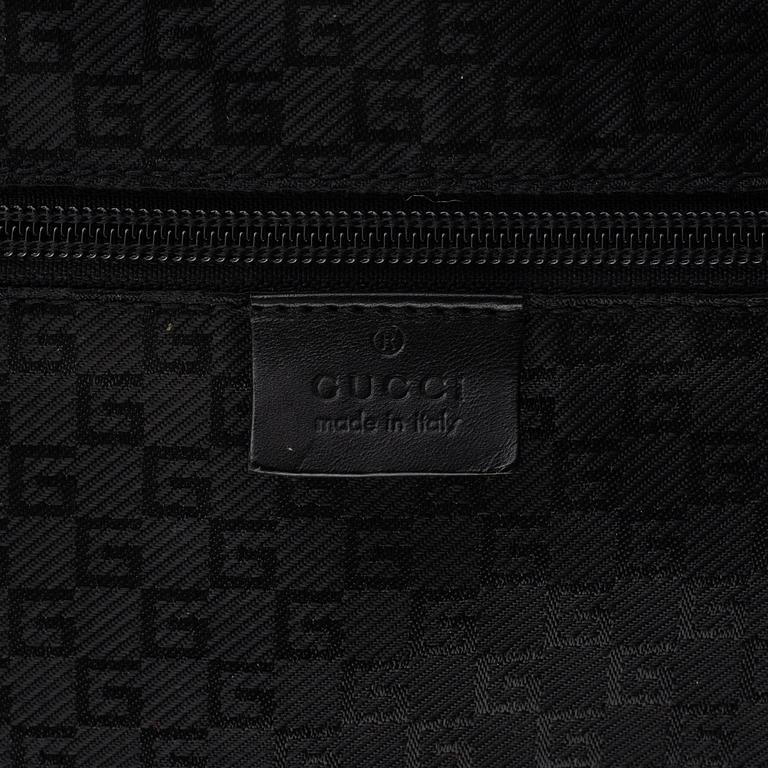 Gucci, suitcase/cabin bag.