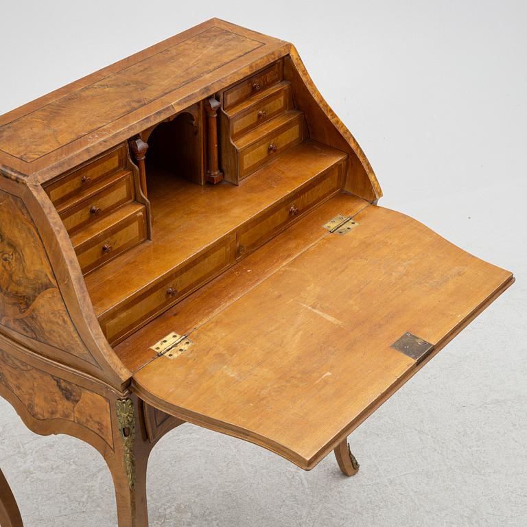 A Rococo-style secretaire, first half of the 20th century.