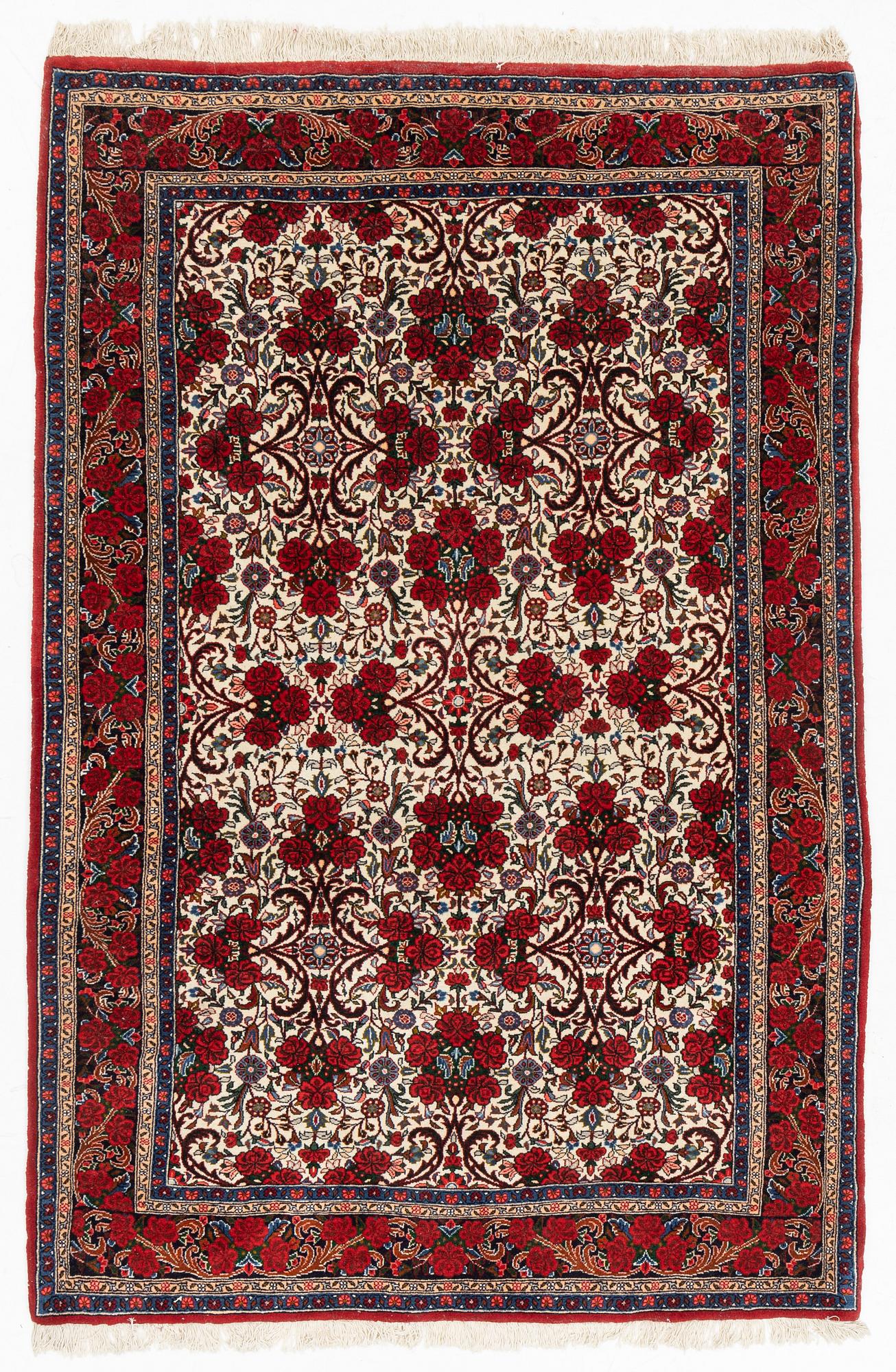 A rug, Ghom, circa 206 x 136 cm.