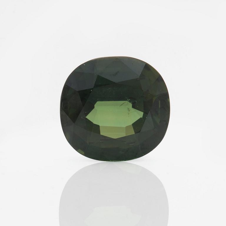 A 6.52 ct green sapphire.