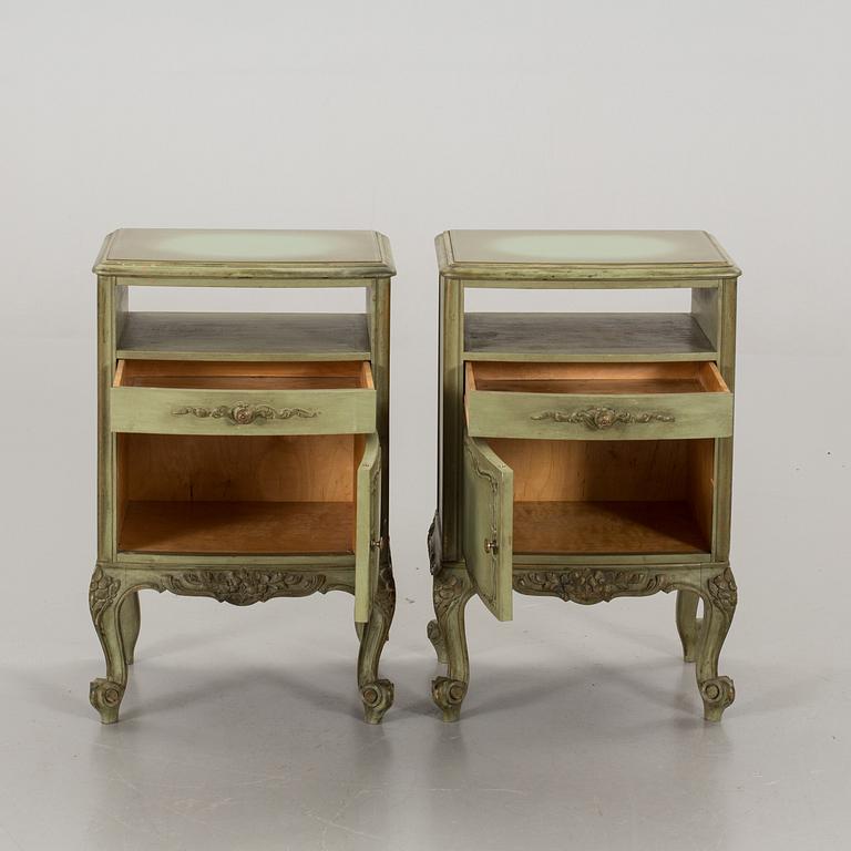 A PAIR OF BEDSIDE TABLES.