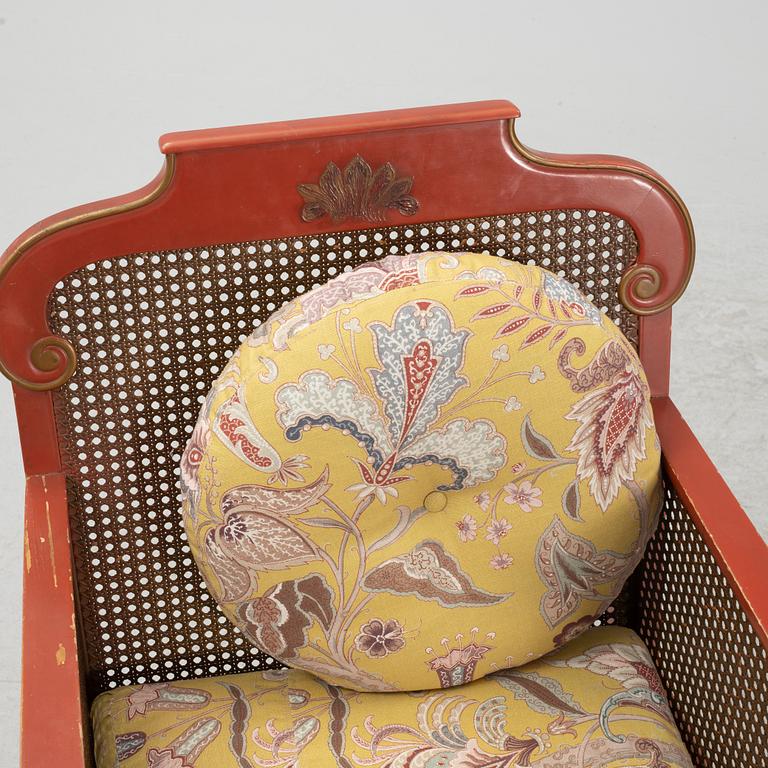 A Swedish Grace sofa, armchair and coffee table, Herbert Anderssons Möbelverkstäder, 1920's.