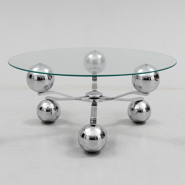 A 1960s / 70s coffee table with glass top.