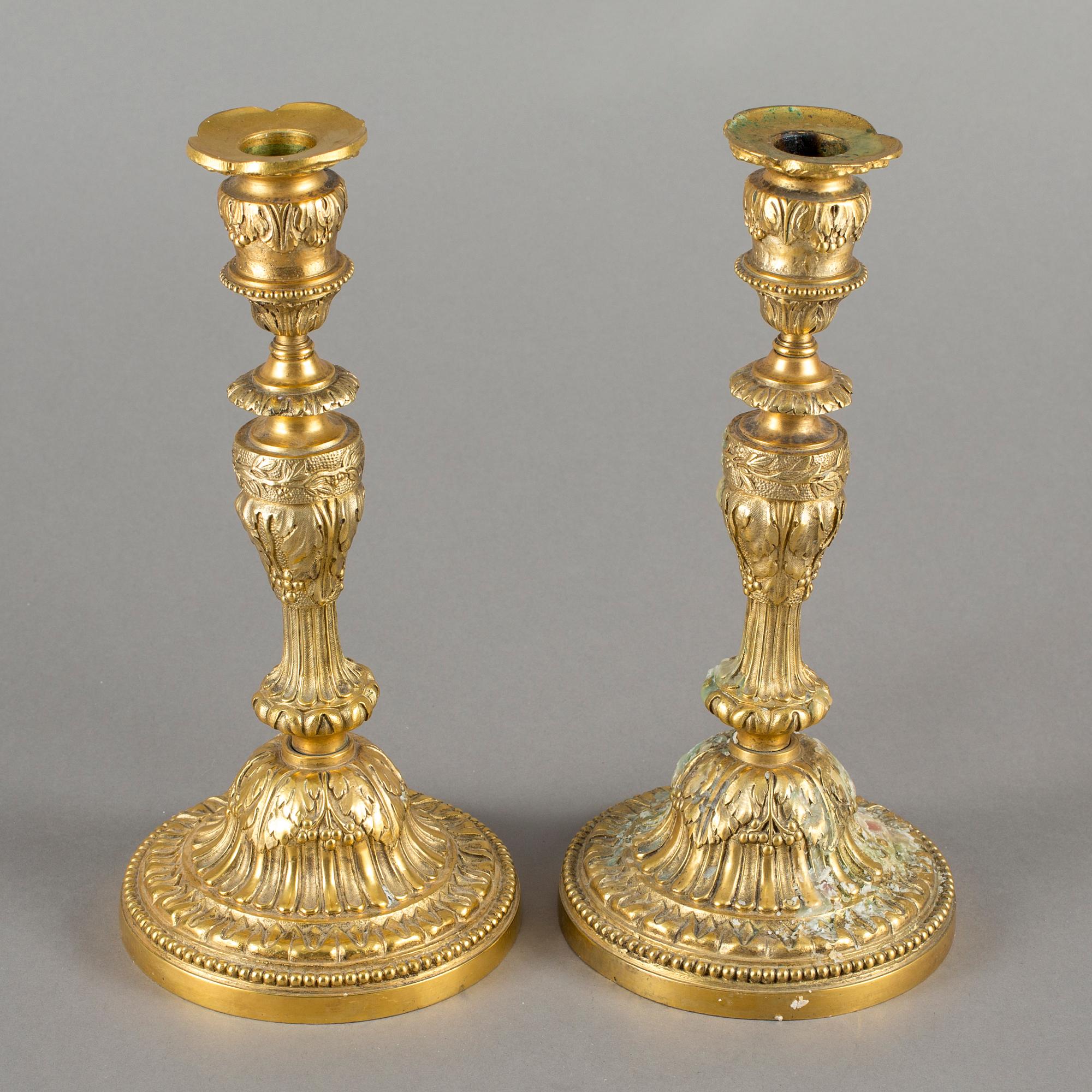 LJUSSTAKAR, ett par, brons, 1800-talets slut.