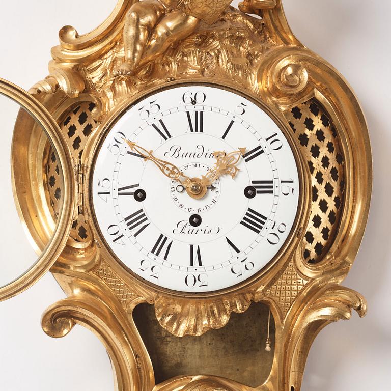 A French Louis XV ormolu cartel clock marked Baudin à Paris, mid 18th century.