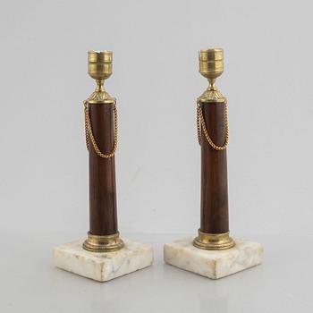 A pair of late Gustavian gilt brass, marble and birch candlesticks, circa 1800.