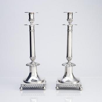 A pair of Swedish early 19th century silver candlesticks, marks of Johan Petter Grönvall, Stockholm 1815.