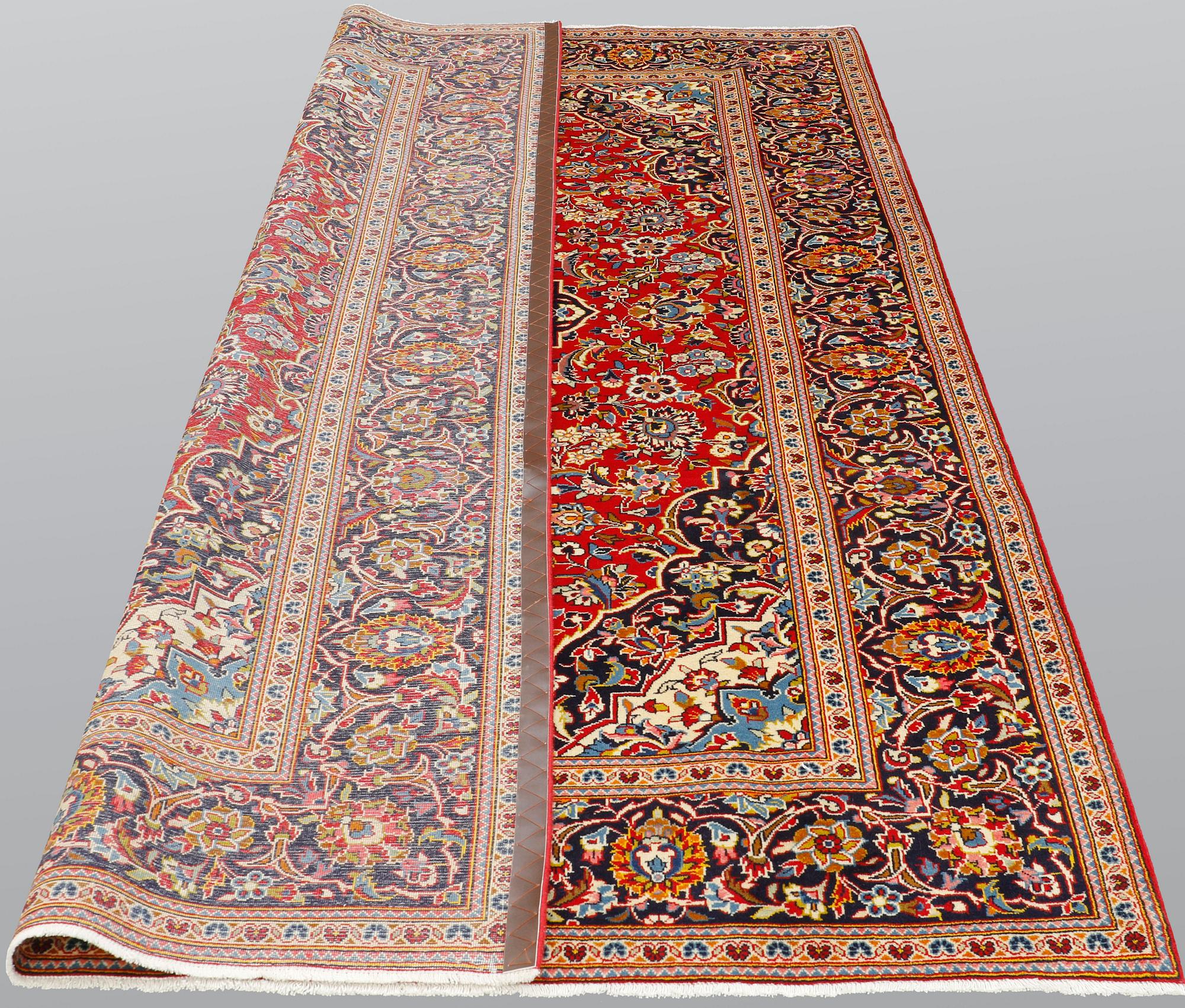 A Keshan carpet, c. 314 x 197 cm.