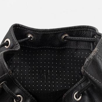 Kenzo, a black leather bucket bag.