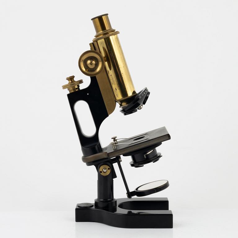 A microscope with accessories, Bausch & Lomb Optical Co. Rochester N.Y, early 20th Century.