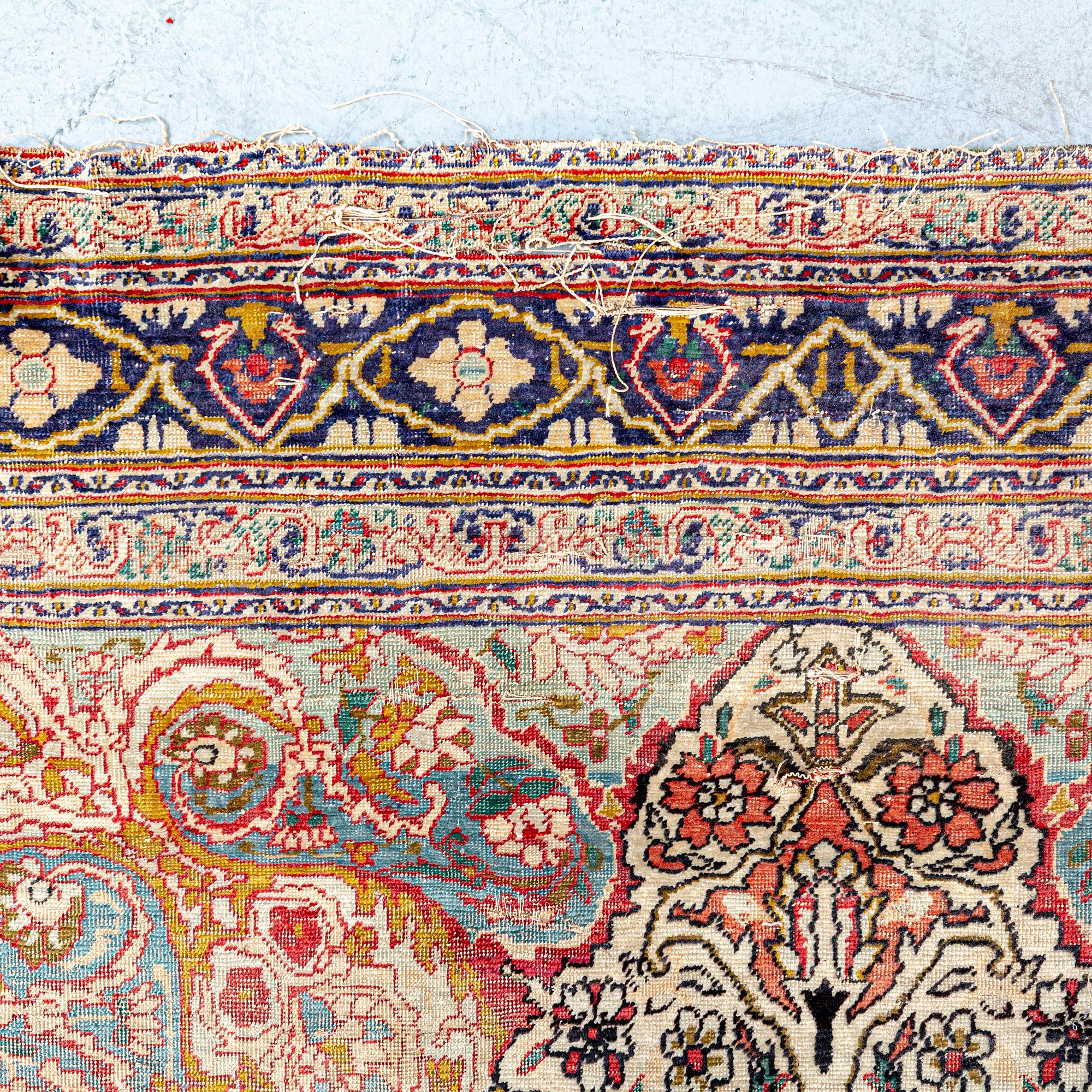 An antique Turkish /Hereke) signed carpet ca 200x121 cm.