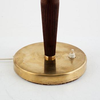 Hans Bergström, a model E1161 brass and teak table lamp, ASEA Belysning, 1940's.