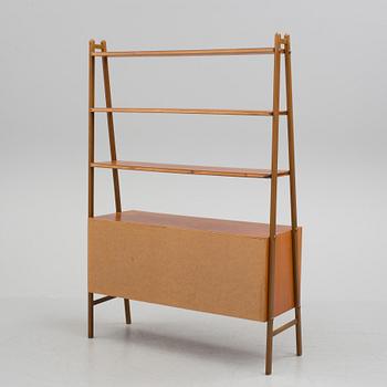 A bookshelf, 1950s/60s.