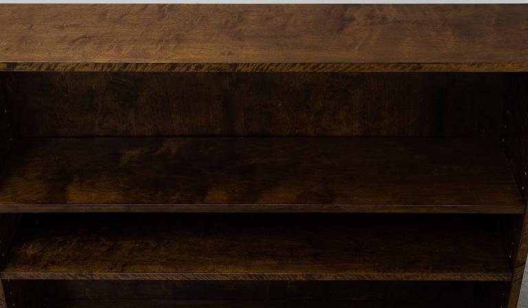 A pair of stained birch veneered bookcases, 1930's.