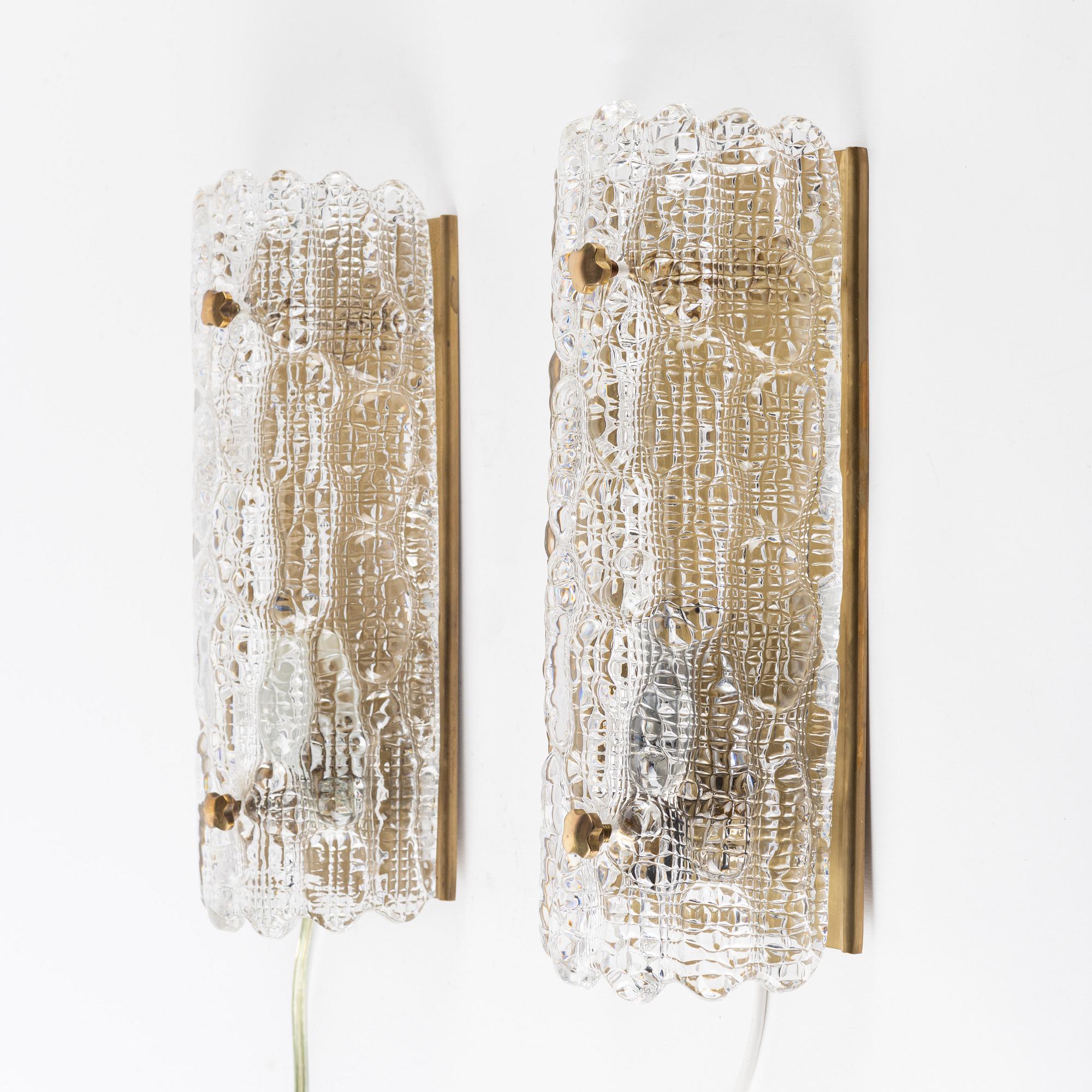 Carl Fagerlund, a pair of glass and brass wall lights, Orrefors, 1960s.