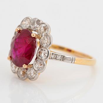 An 18K gold and platinum ring set with a faceted ruby weight ca 3.35 cts.