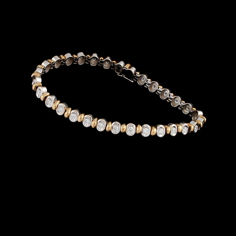 ARMLÄNK, 18k guld och vitguld med 30 briljantslipade diamanter, ca 1.20 ct, Italien, 1900-talets slut.  Vikt 19 g.