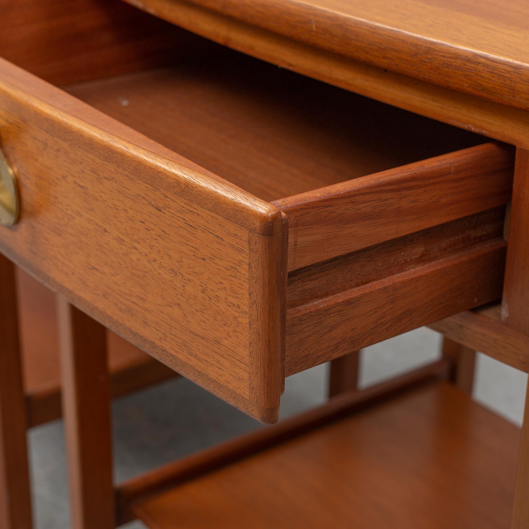 KERSTIN HÖRLIN-HOLMQUIST,  pair of mahogany bedside tables from Nordiska Kompaniet.