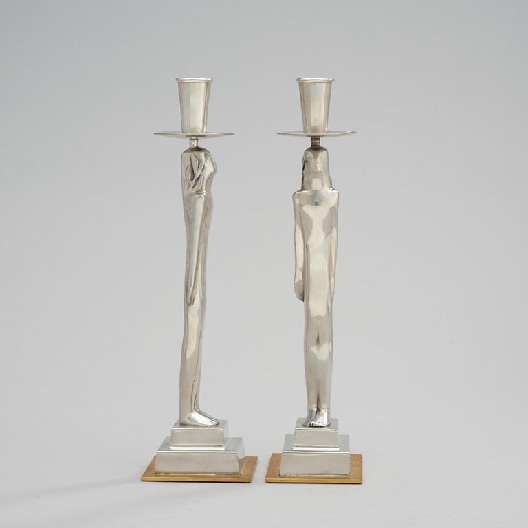 A pair of Edvin Öhrström 'Egyptian' pewter candlesticks, Svenskt Tenn, Stockholm 2001.