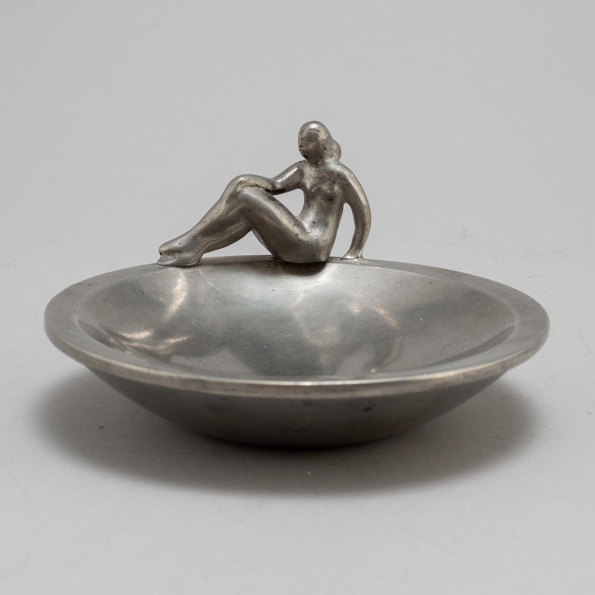 a pewter plate by Firma Svenskt Tenn Stockholm, 1928.