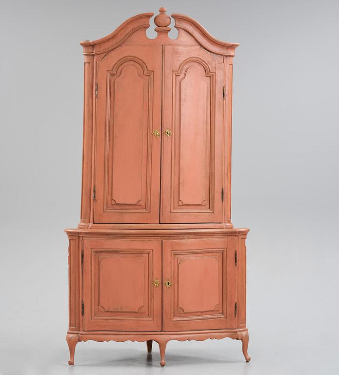 A rococo corner cabinet, later part 18th century.