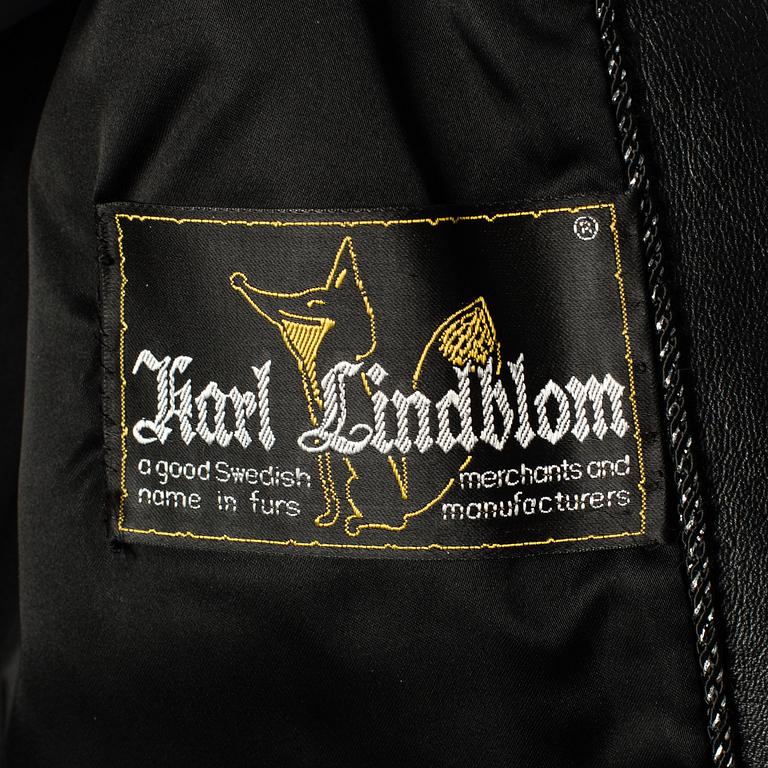 A fox jacket by Karl Lindblom, Stockholm, in size app 38.