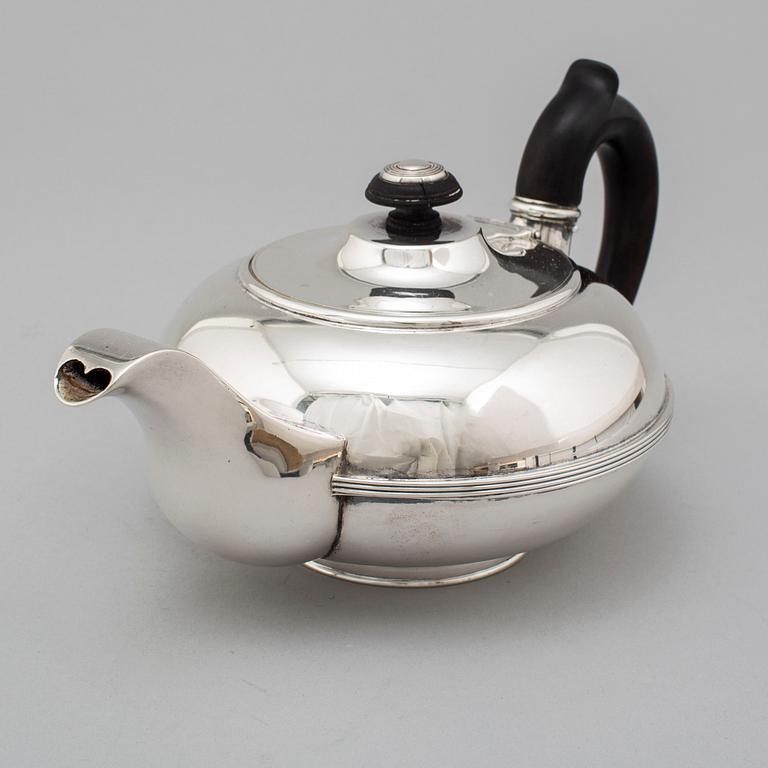 A Russian 19th century parcel-gilt tea-pot, unidentified makers mark, St. Petersburg.