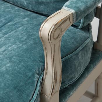 A Gustavian style armchair from the latter half of the 20th century.