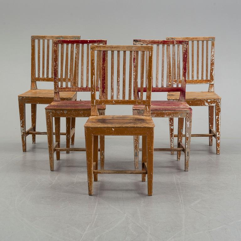 Five painted pine chairs, 19th Century.