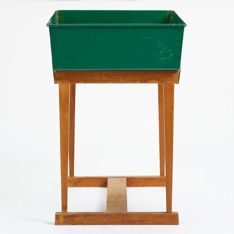 Josef Frank, a rare flower table with green lacquered box model "B 2084", Firma Svenskt Tenn, Sweden, 1950-60s.