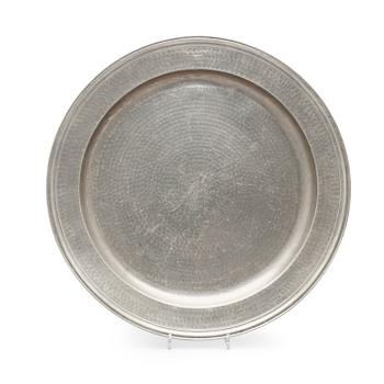 1650. A pewter charger by L C Schönfeldt 1706.