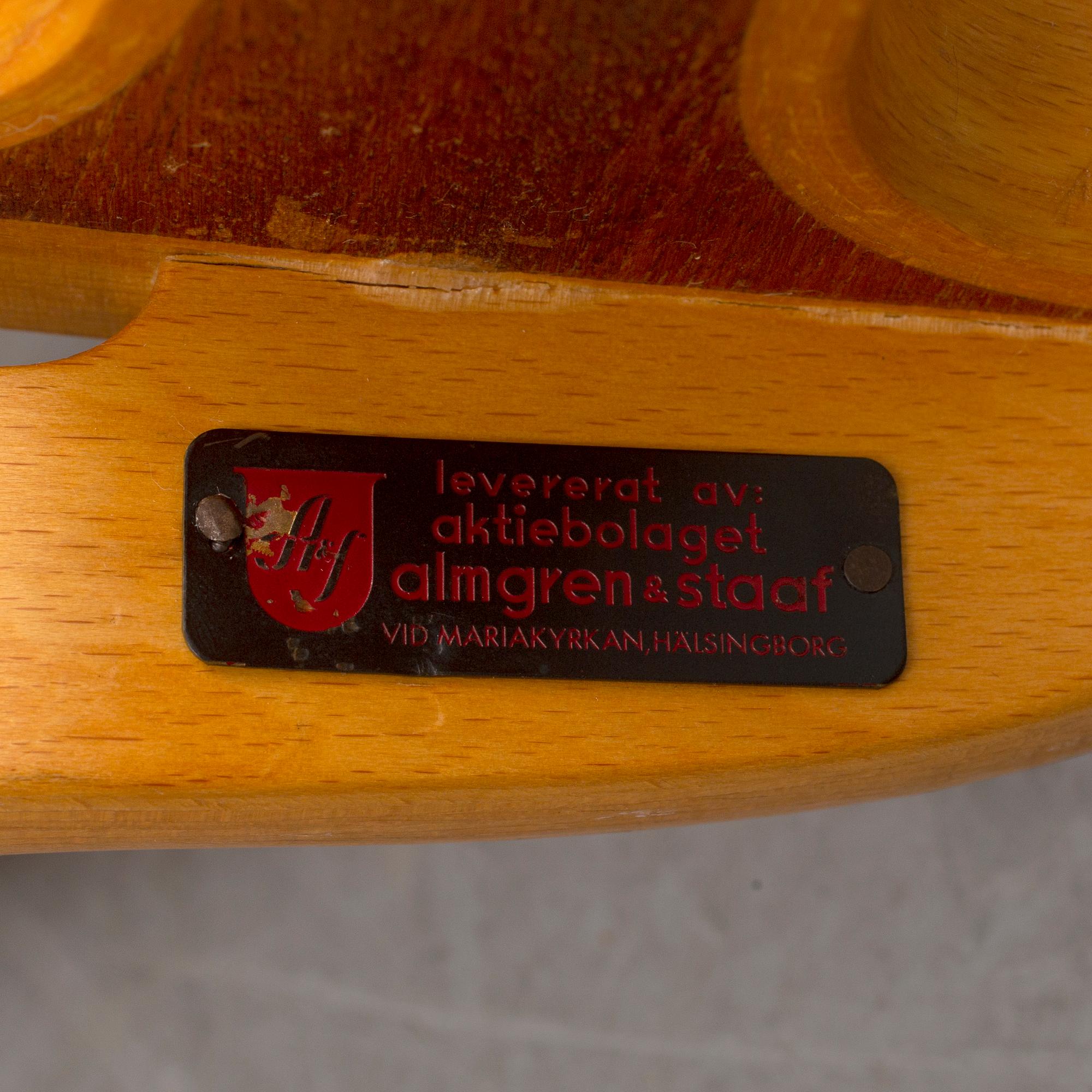 PETER HVIDT & ORLA MØLGAARD NIELSEN, a teak and beech 'Ax-chair', designed 1947, Fritz Hansen.