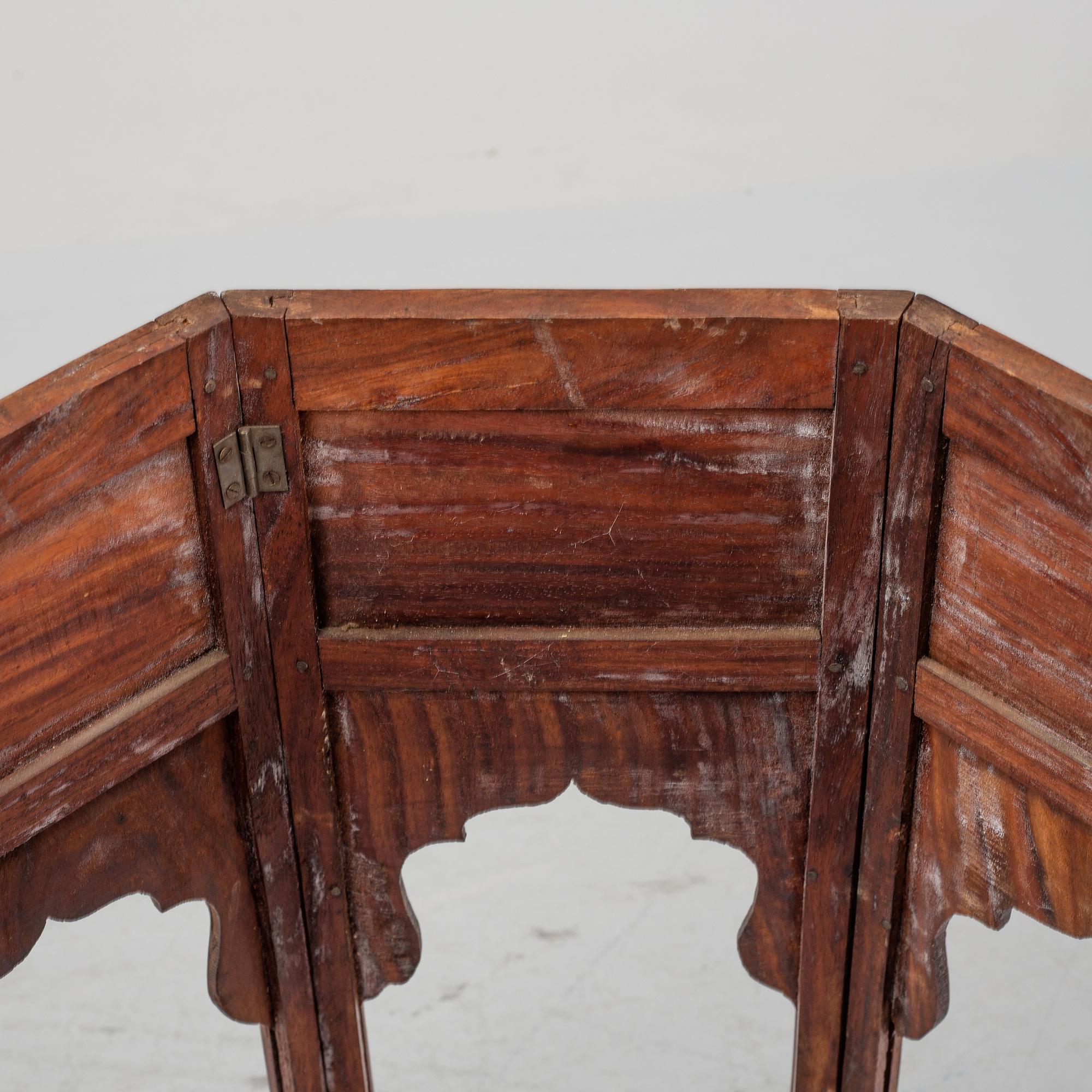 An Anglo Indian folding octagonal side table.