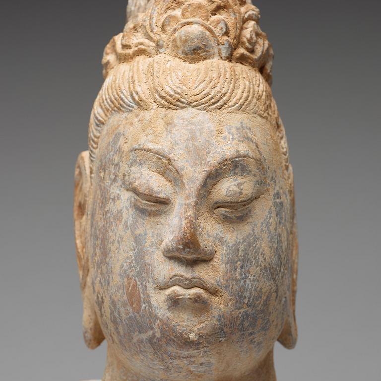 A stone sculpture of Guanyin, presumably Ming dynasty, 17th Century.