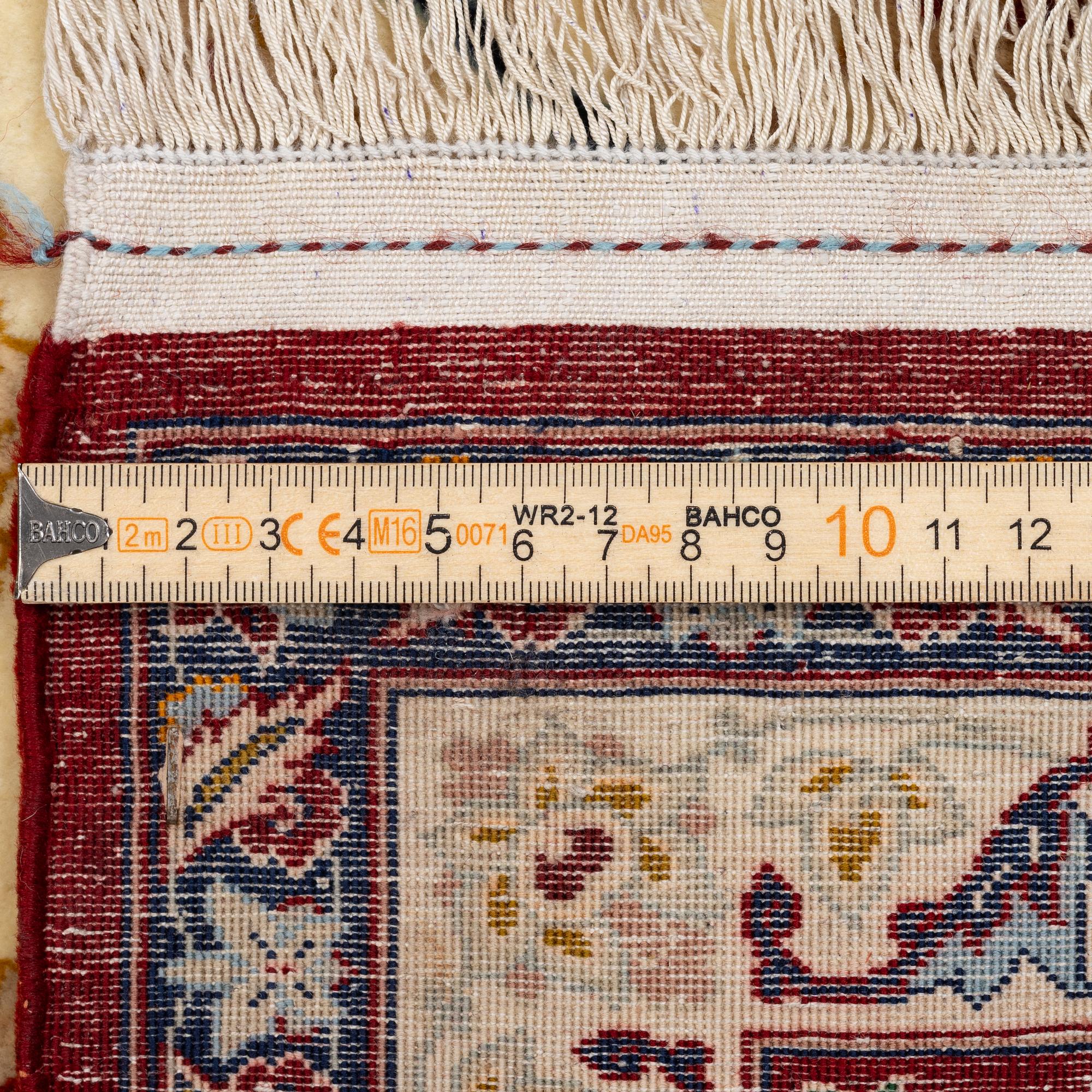 An Isfahan carpet, Central Persia, signed Akbaroff, c. 315 x 205 cm.