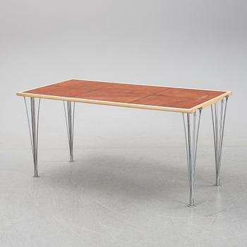 A birch and leather dining table produced by Mathsson International, 21th century.
