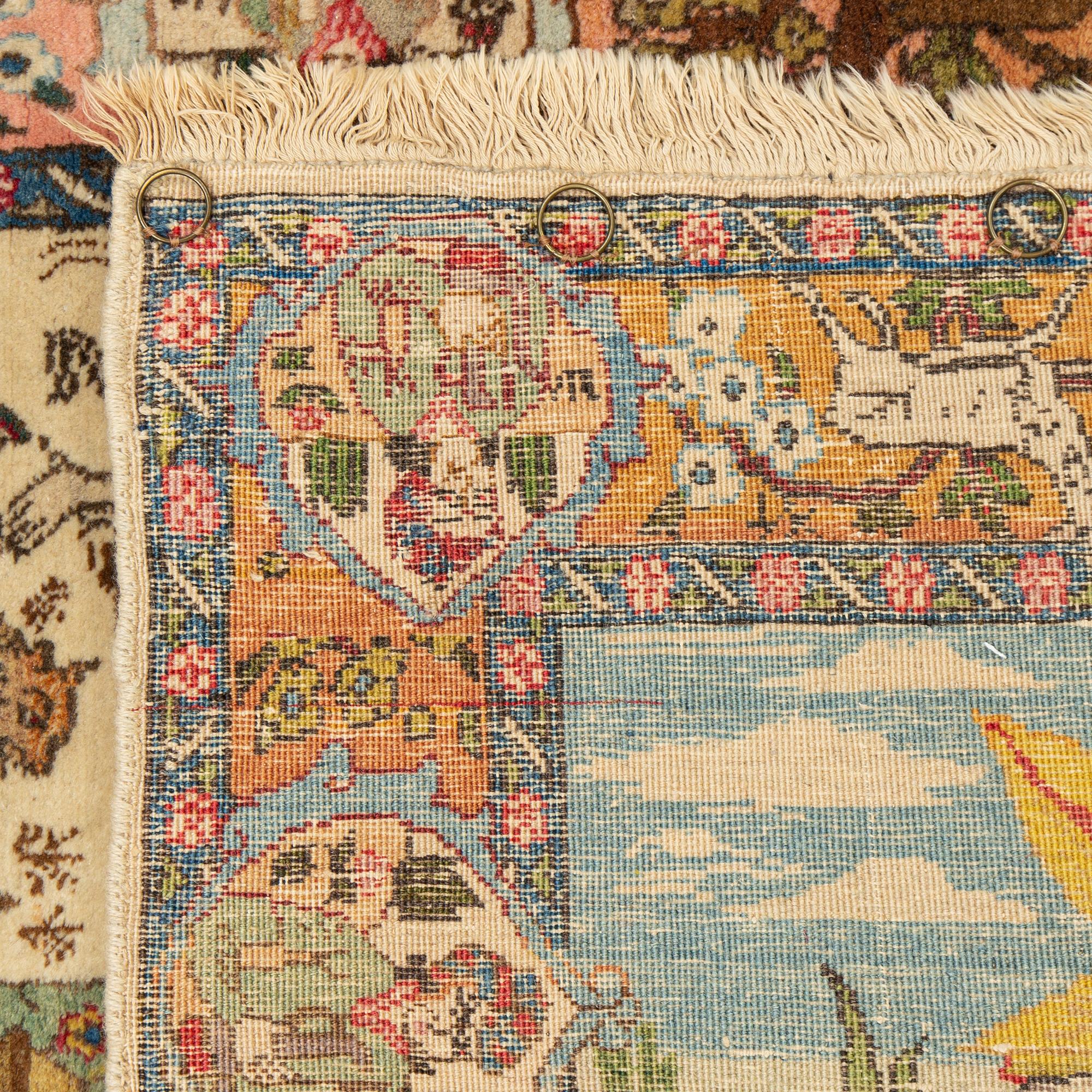 A rug, semi-antique Tabriz, ca 142 x 81 cm.